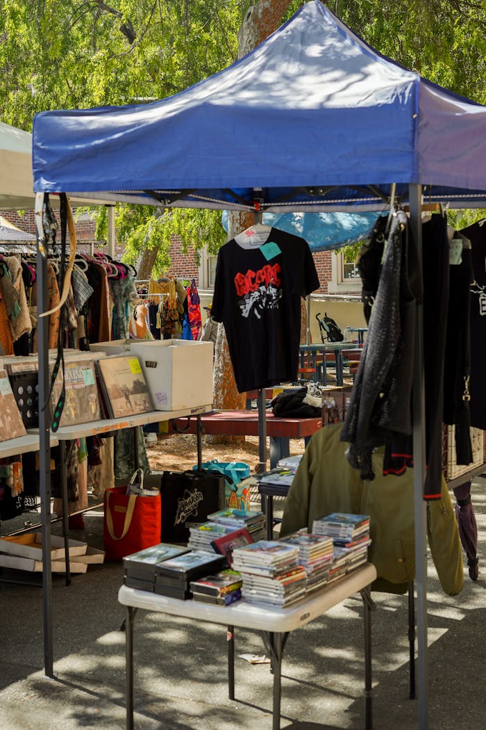 A tent with books and clothing on display